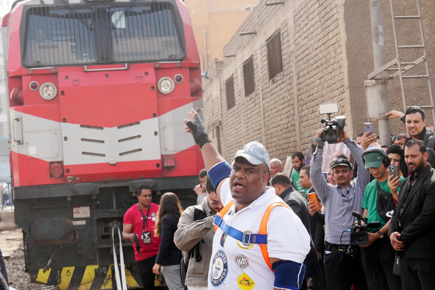 Pulling train with teeth: The feats of Egypt's strongman Ashraf
